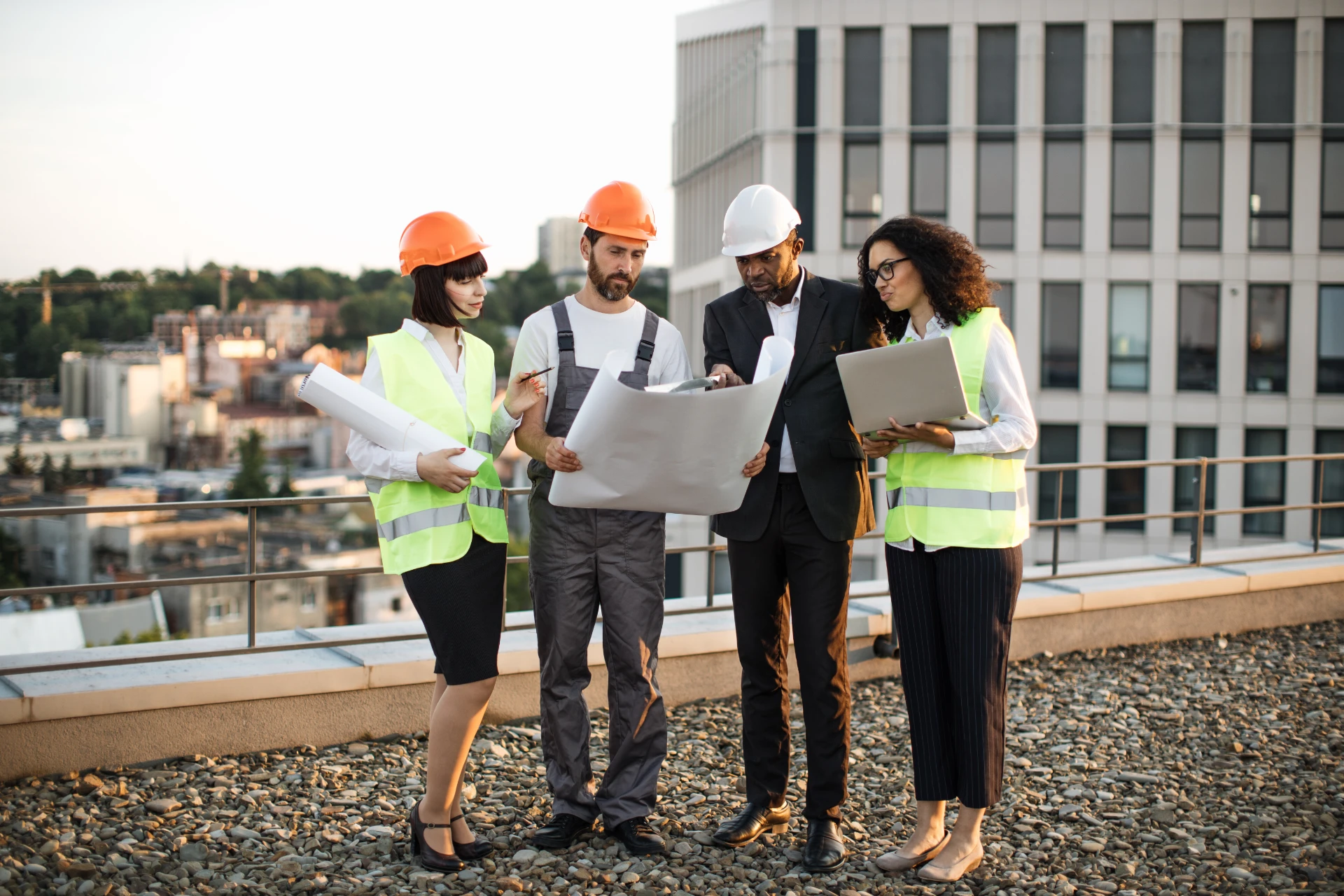 diverse-architects-looking-together-at-project-sch-2024-12-13-09-49-14-utc
