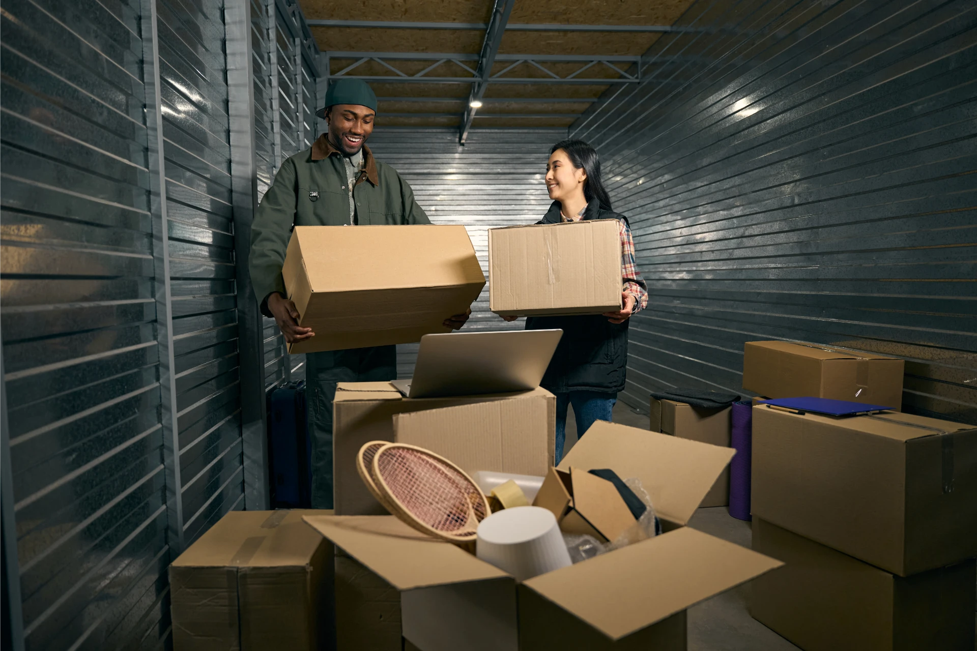 team-of-coworkers-containerizing-goods-in-storage-2024-05-27-15-50-20-utc